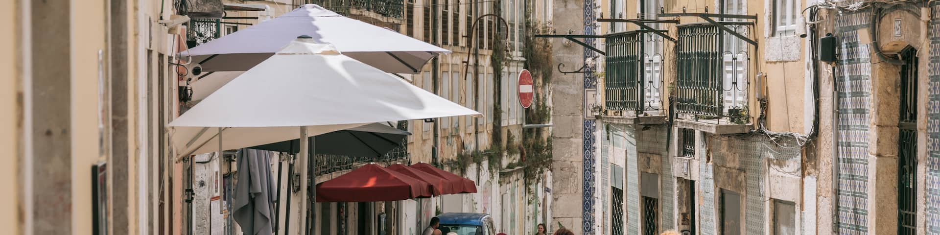 Bairro Alto which includes outdoor eating, a city and street scenes