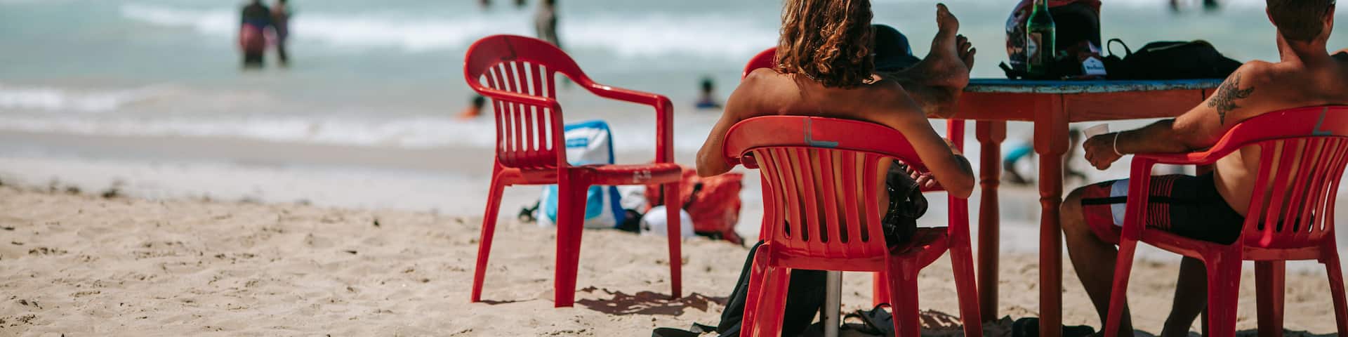 Macao Beach featuring a sandy beach and general coastal views as well as a small group of people