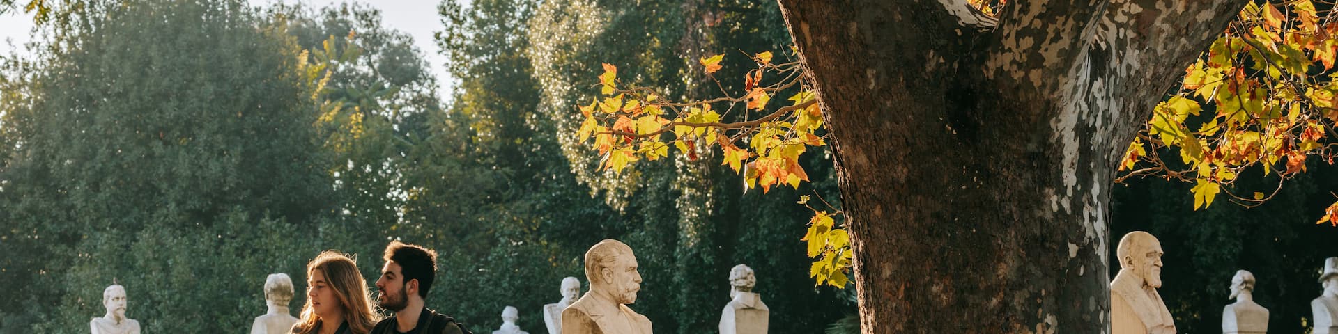 Passeggiata del Gianicolo showing a garden and a sunset as well as a couple