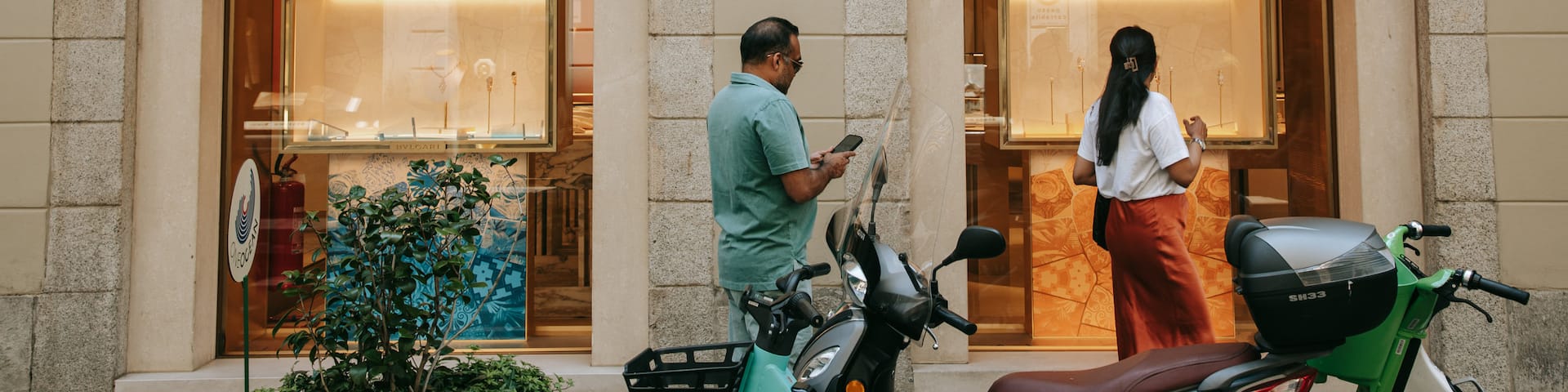 Milan Fashion District which includes signage, shopping and street scenes