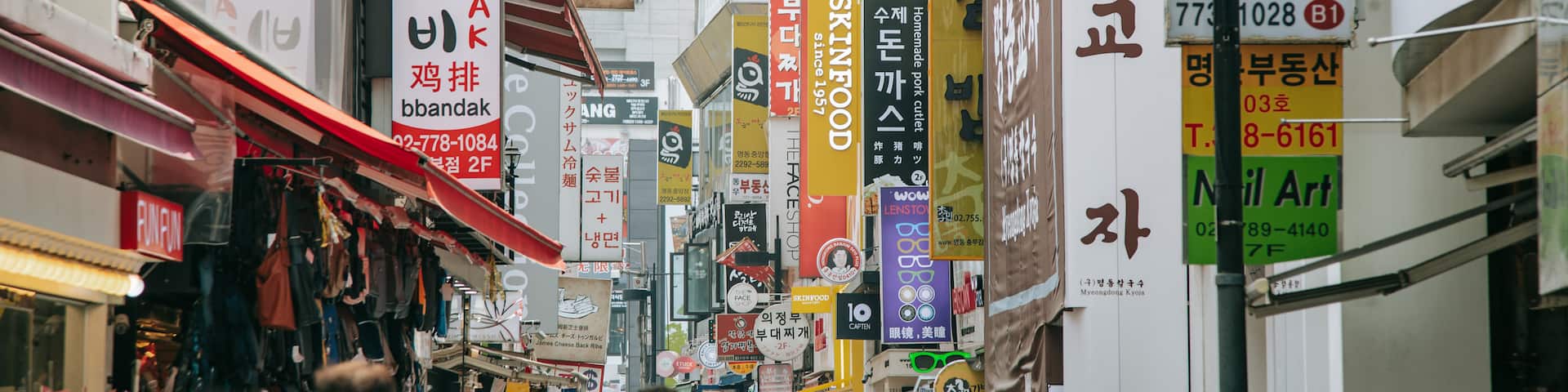 Myeong-dong featuring street scenes and a city