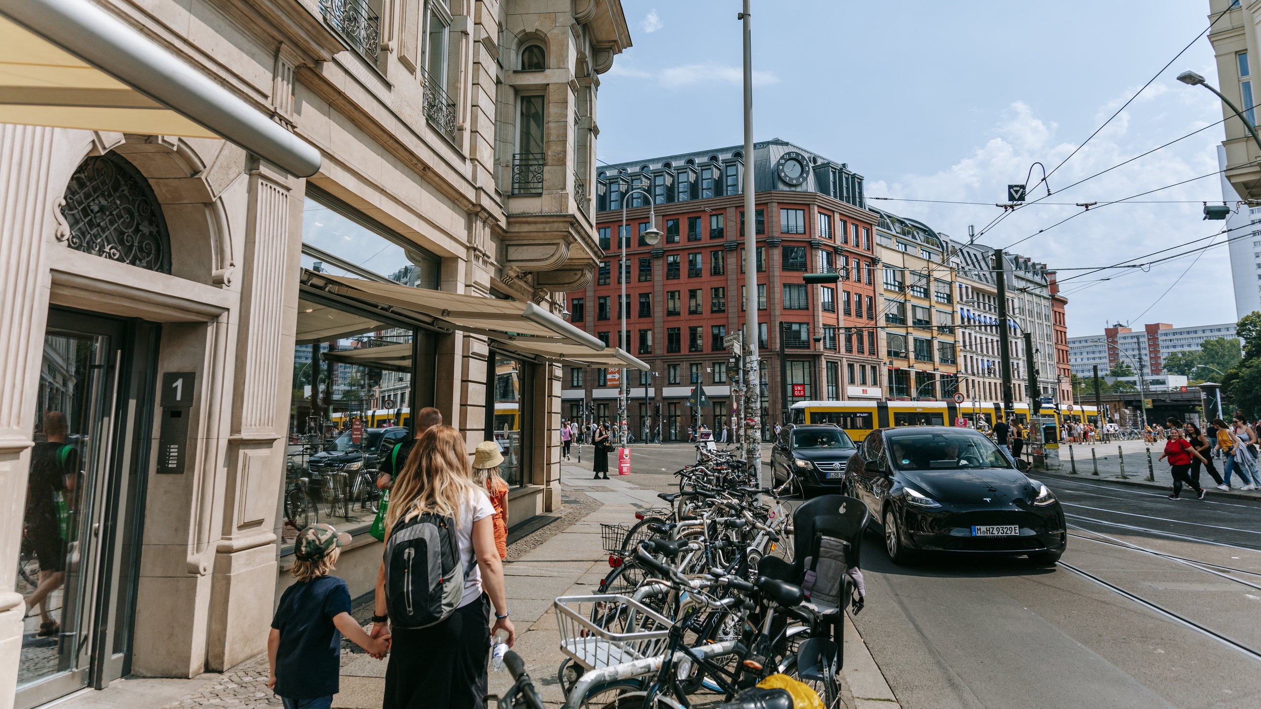 Oranienburger Strasse featuring a city and street scenes as well as a family