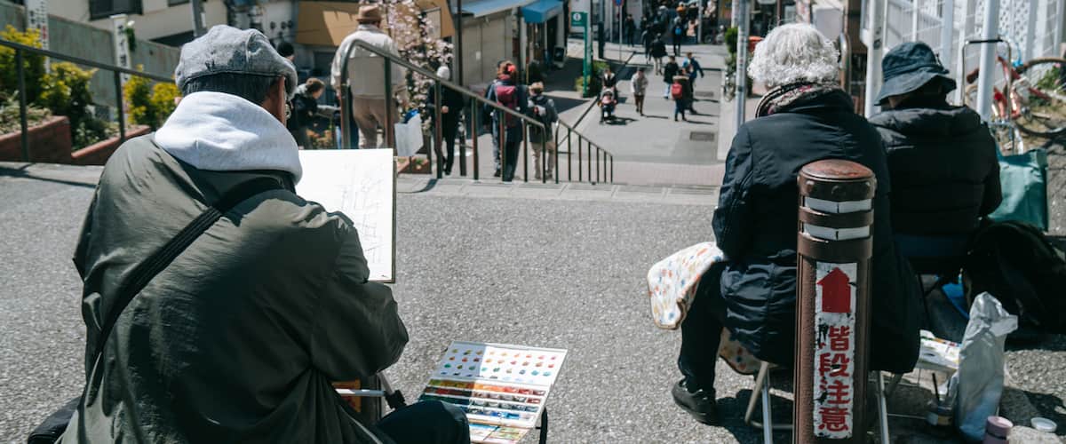 Yanaka showing street scenes as well as a small group of people