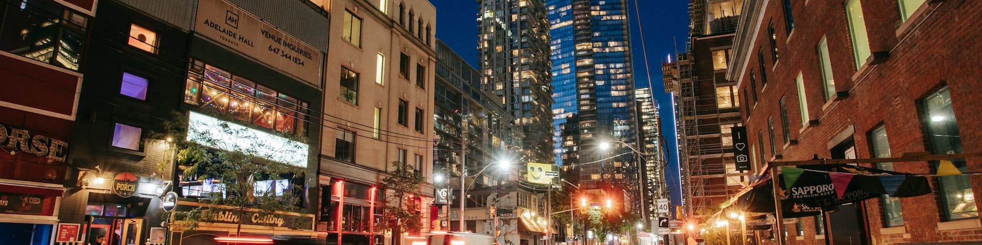 Toronto Entertainment District featuring a city and night scenes