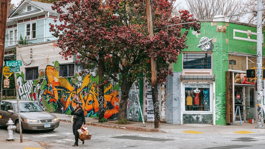 Little Five Points showing street scenes as well as an individual femail
