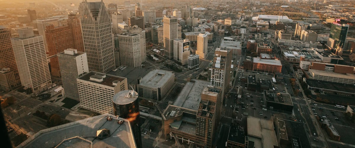 GM Renaissance Center featuring a sunset, a city and landscape views