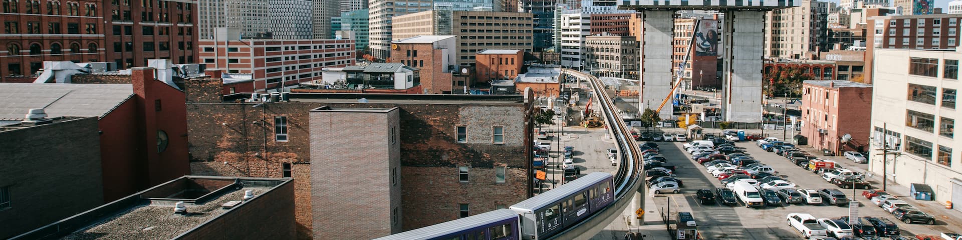Greektown Historic District showing railway items, a city and landscape views
