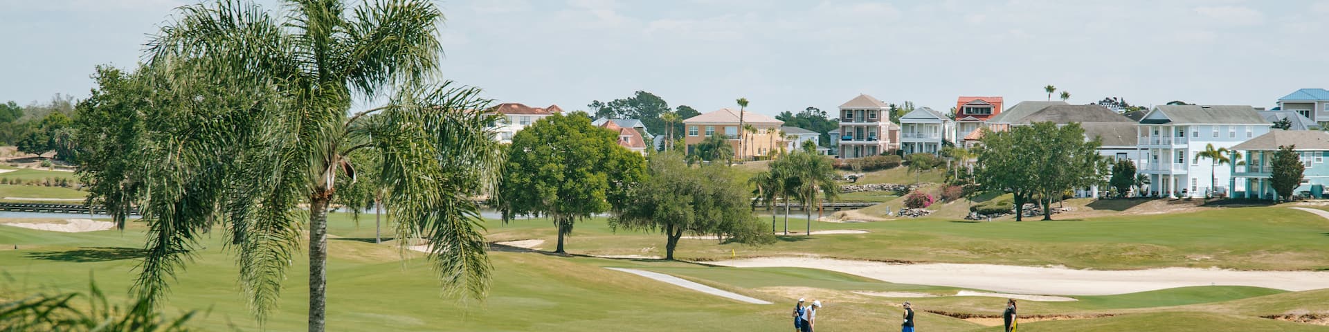 Reunion which includes golf and landscape views as well as a small group of people