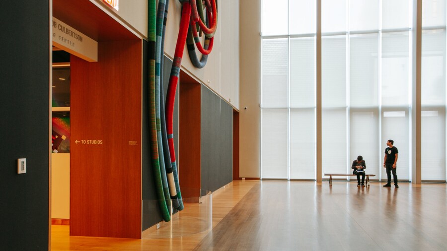 Interior view of Mint Museum Uptown featuring modern design and art installations in Charlotte, North Carolina.