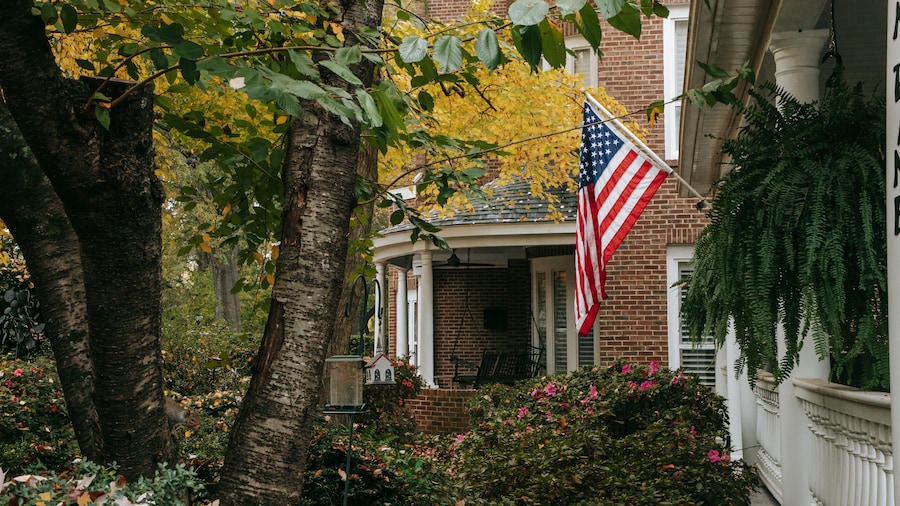 Tree-lined streets with Victorian homes in Fourth Ward, Charlotte, North Carolina.