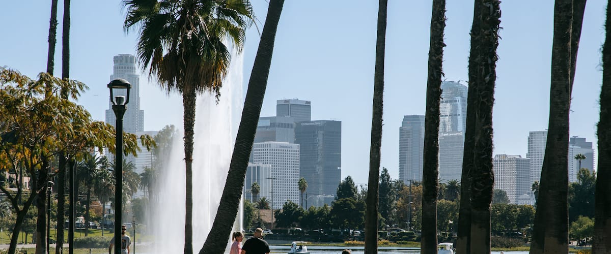 Echo Park showing a park and a fountain as well as a couple