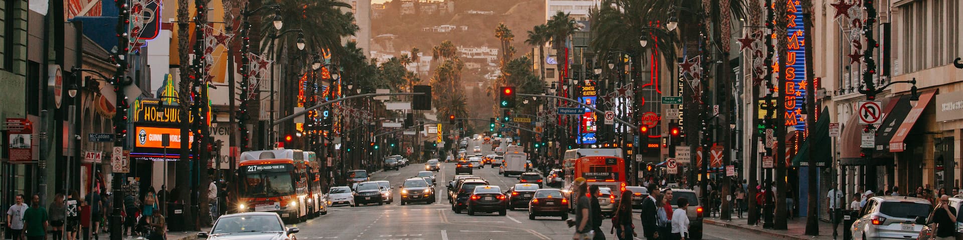 Hollywood showing a sunset, street scenes and a city