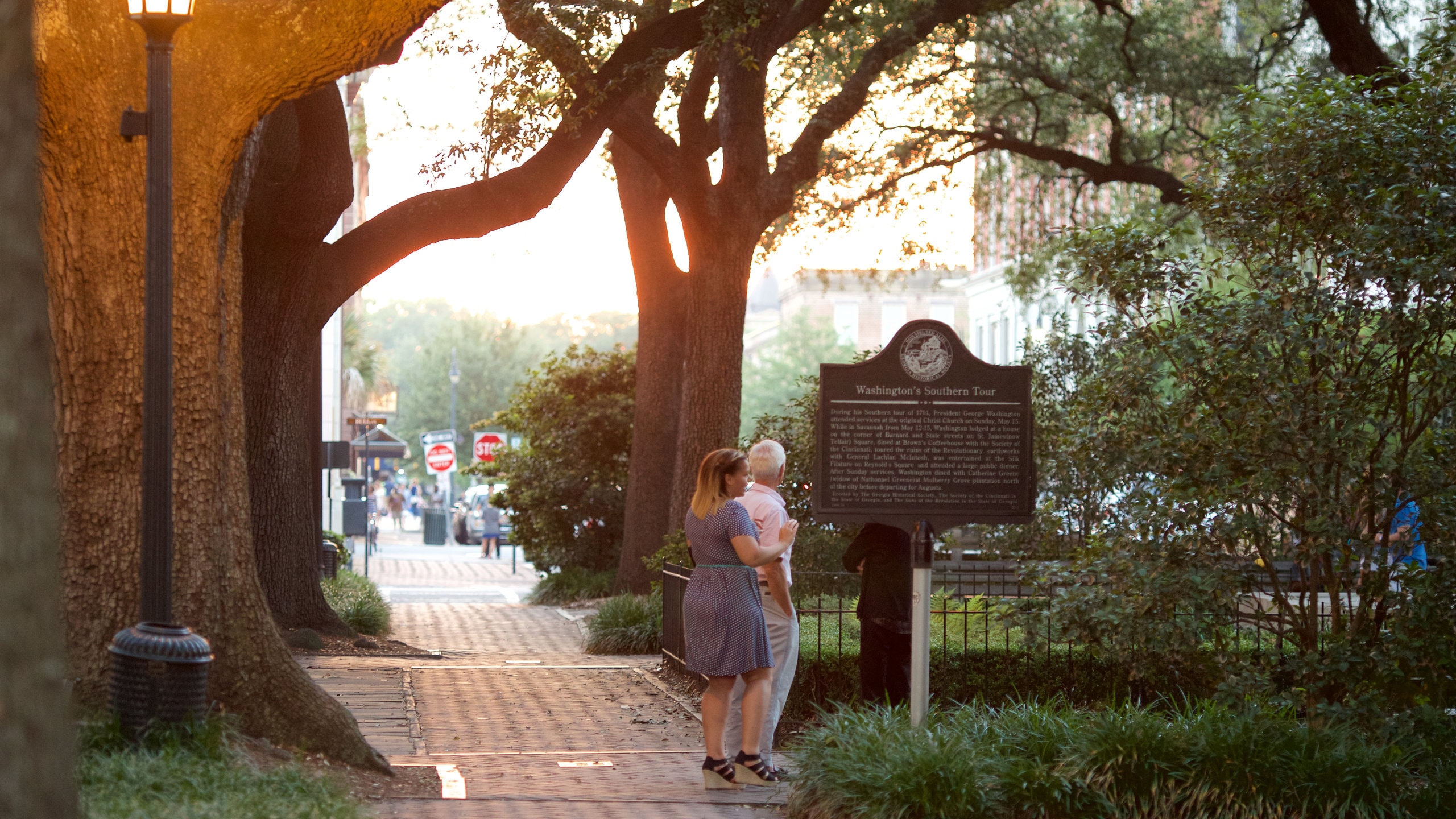 Savannah which includes a garden and signage as well as a couple