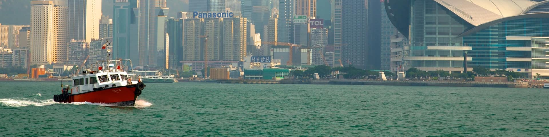 Victoria Harbour featuring skyline, a city and boating