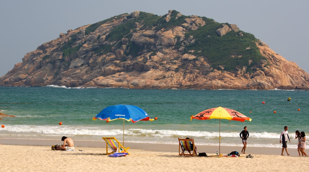 Shek O Beach which includes a beach and general coastal views