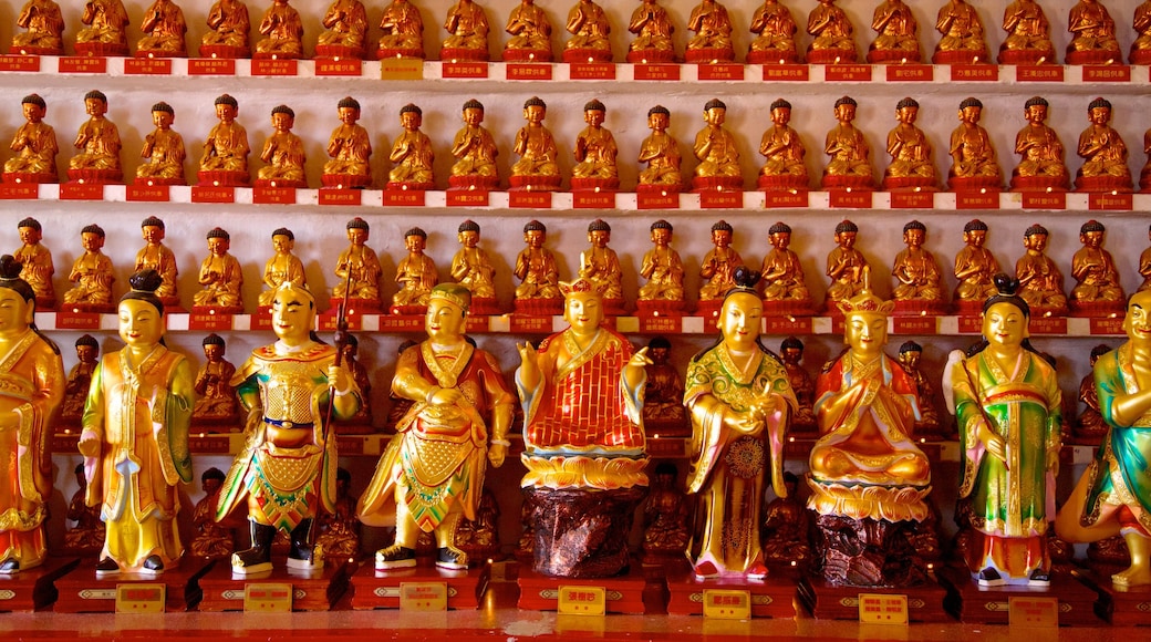 Ten Thousand Buddhas Monastery featuring religious elements, interior views and a temple or place of worship