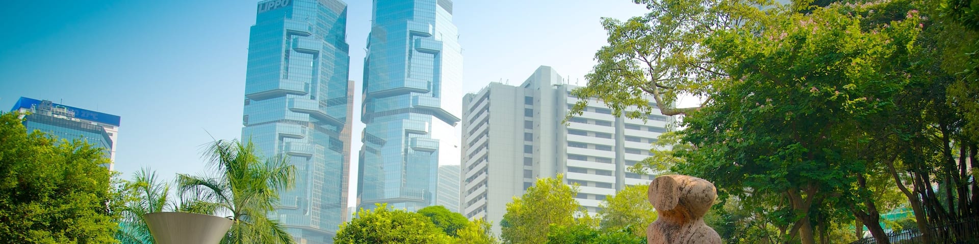 Hong Kong Park which includes a park, outdoor art and a high rise building