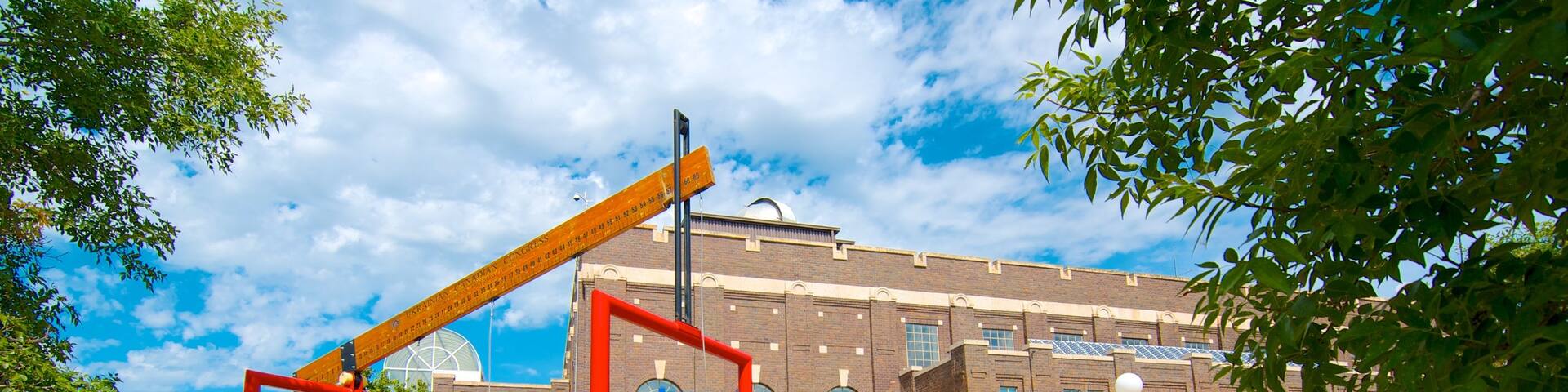 Regina which includes outdoor art and signage