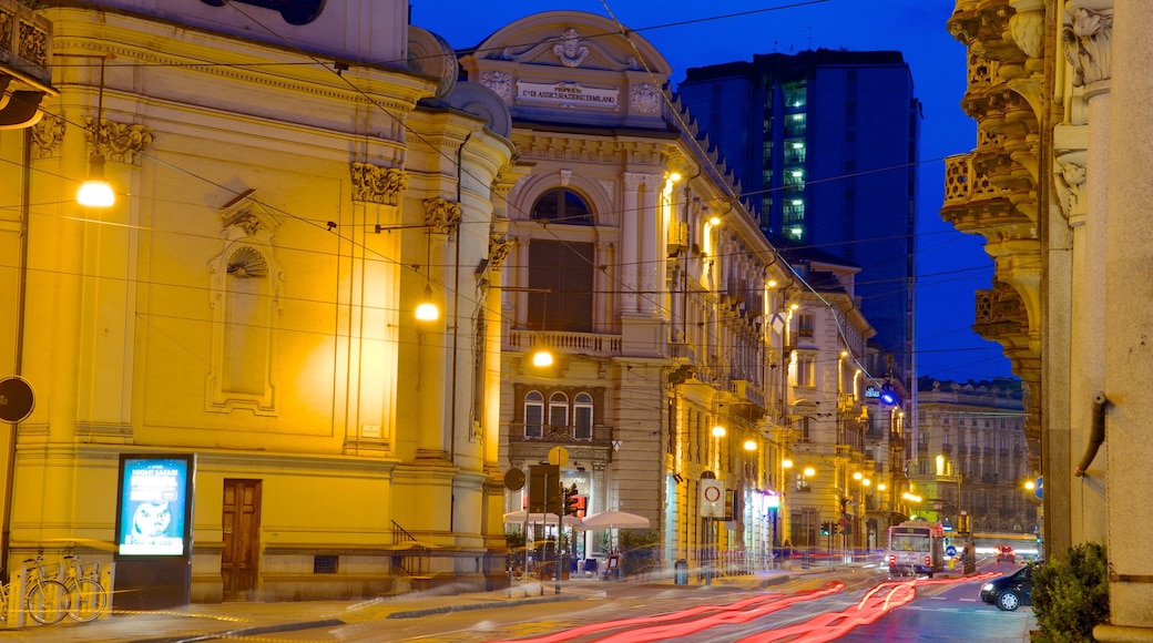 Turin which includes night scenes, a city and street scenes