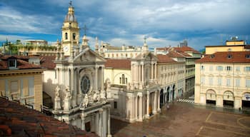 Piazza San Carlo which includes a city, a church or cathedral and street scenes