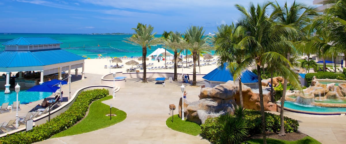 Cable Beach which includes tropical scenes, a luxury hotel or resort and general coastal views
