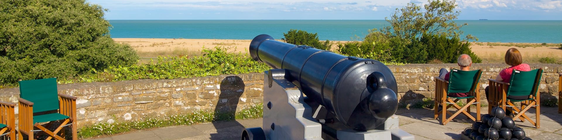 Walmer Castle and Gardens featuring general coastal views, a monument and military items