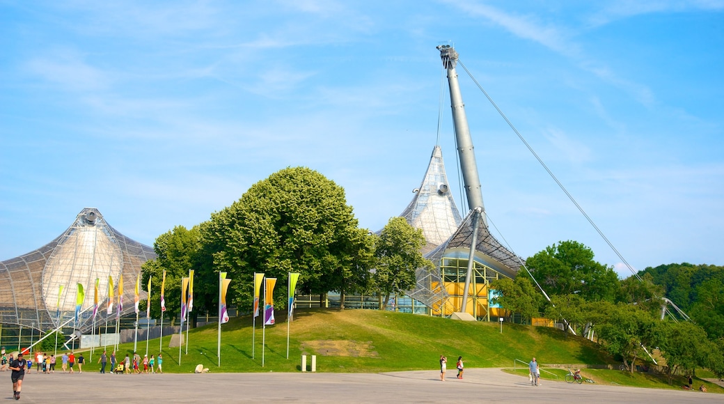 Olympic Stadium which includes modern architecture as well as a large group of people