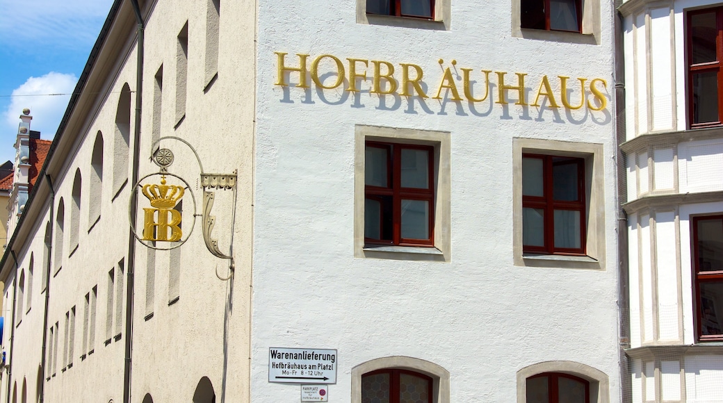 Hofbrauhaus featuring heritage architecture, signage and a city