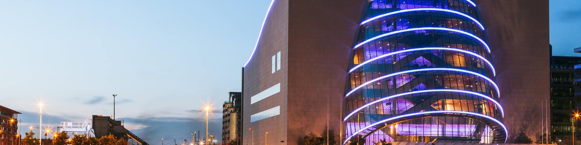 The Convention Centre Dublin featuring modern architecture, a sunset and night scenes