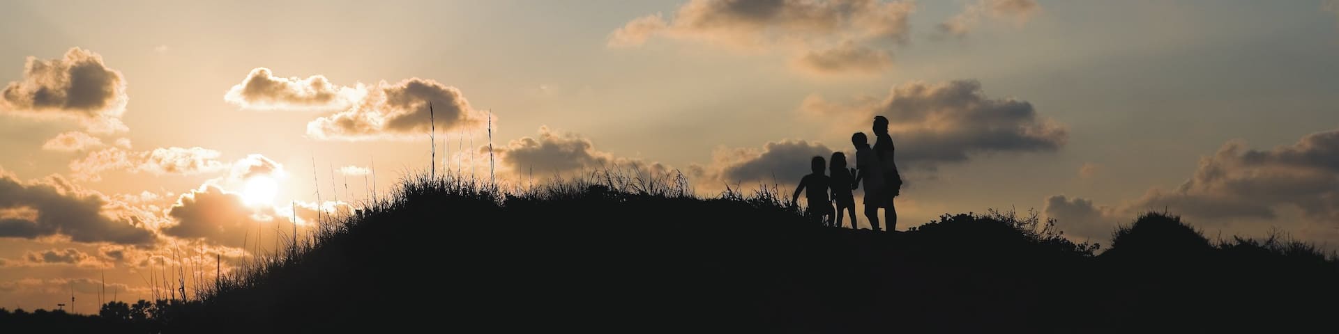 South Padre Island presenterar en solnedgÄng och vandring sÄvÀl som barn