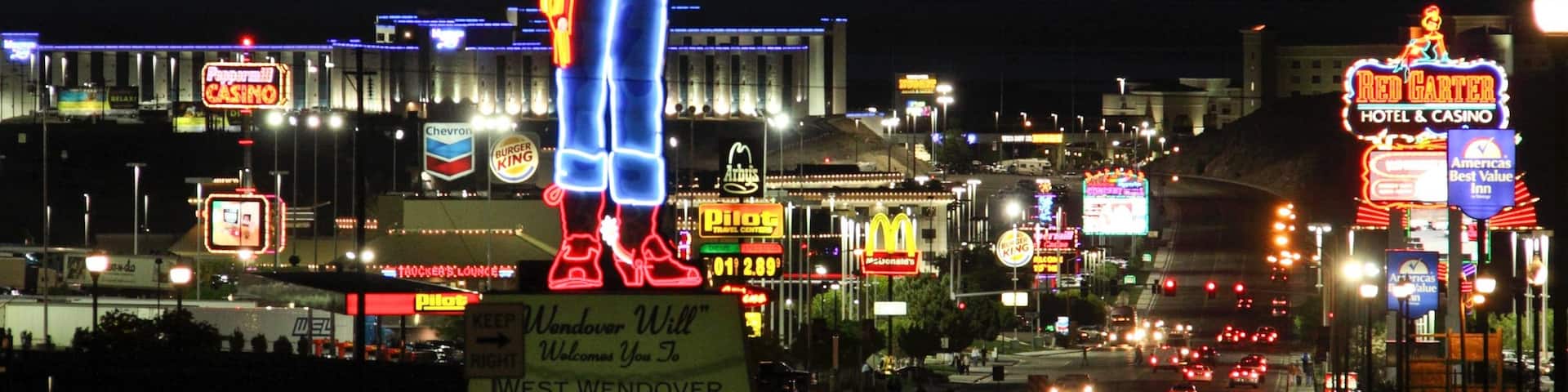 Wendover which includes night scenes, cbd and signage