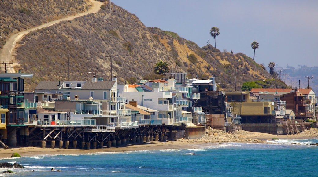 Malibu showing a house, a coastal town and a sandy beach