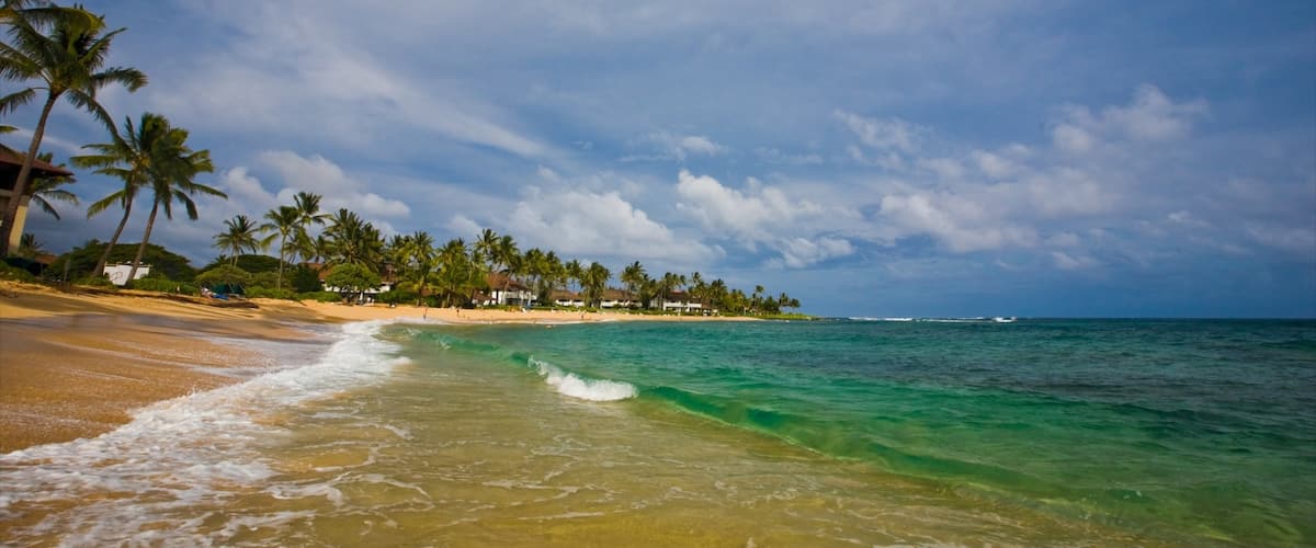 Poipu showing a beach, tropical scenes and landscape views
