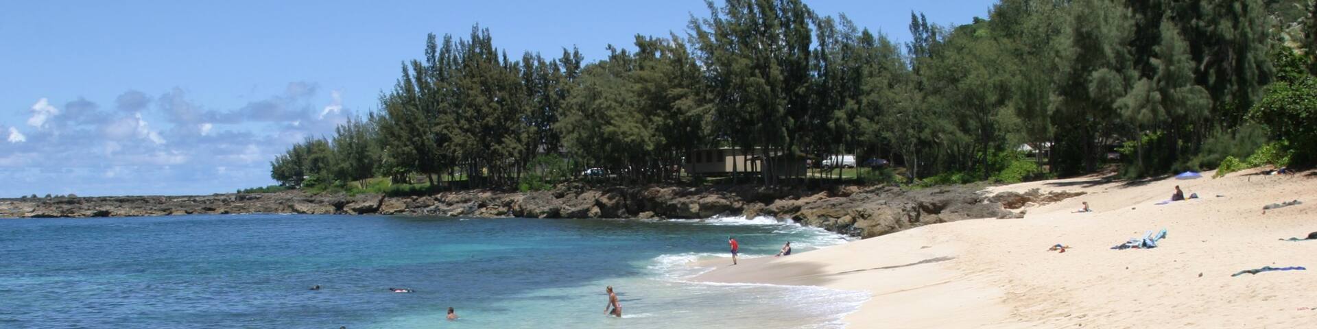 Pupukea Beach Park que incluye natación, vistas de paisajes y una playa de arena
