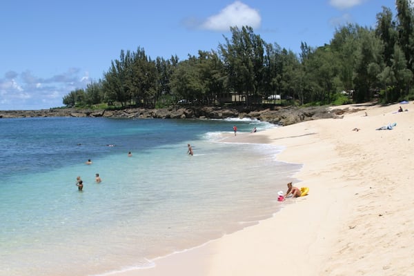 Pupukea Beach Park featuring a beach, swimming and landscape views