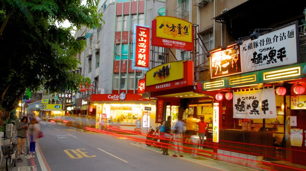 Yong Kang Street showing signage, street scenes and shopping