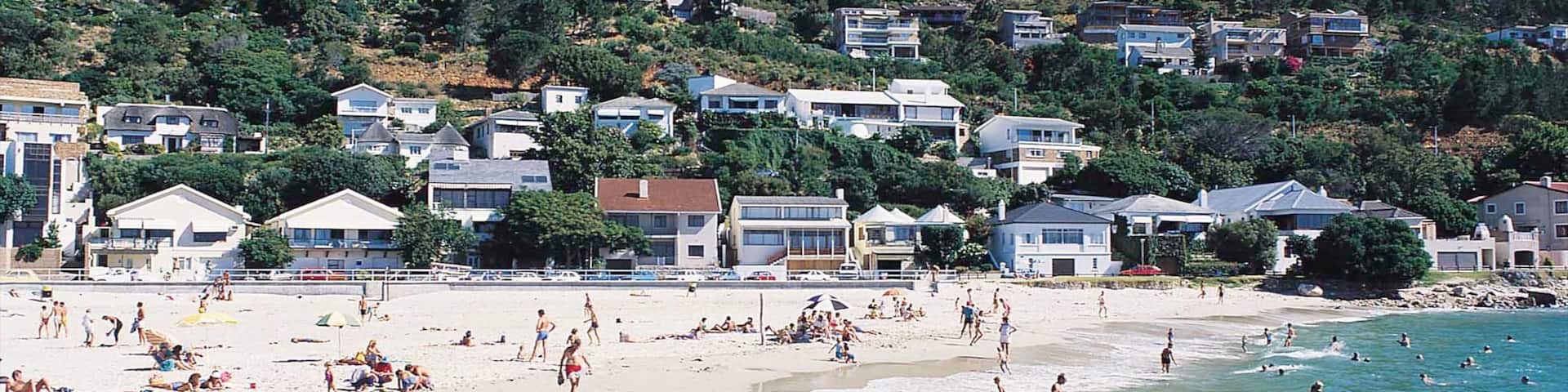 Gordon\'s Bay which includes swimming, a sandy beach and a coastal town