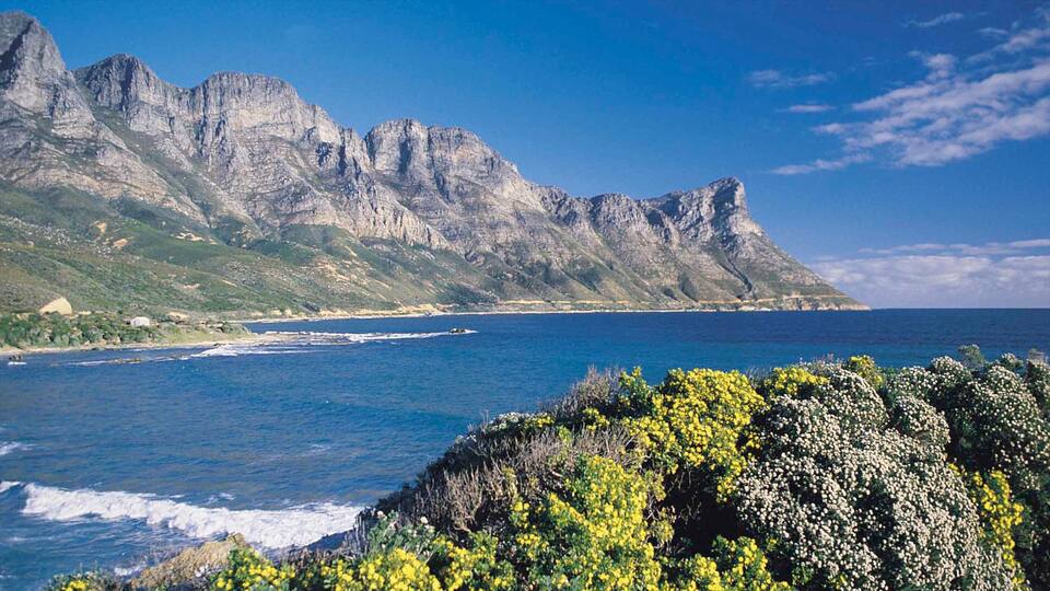 Gordon\'s Bay showing mountains, a bay or harbor and landscape views
