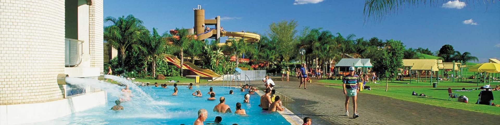 Bela-Bela showing a luxury hotel or resort, a pool and swimming