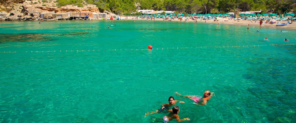 Benirras Beach which includes tropical scenes, landscape views and swimming