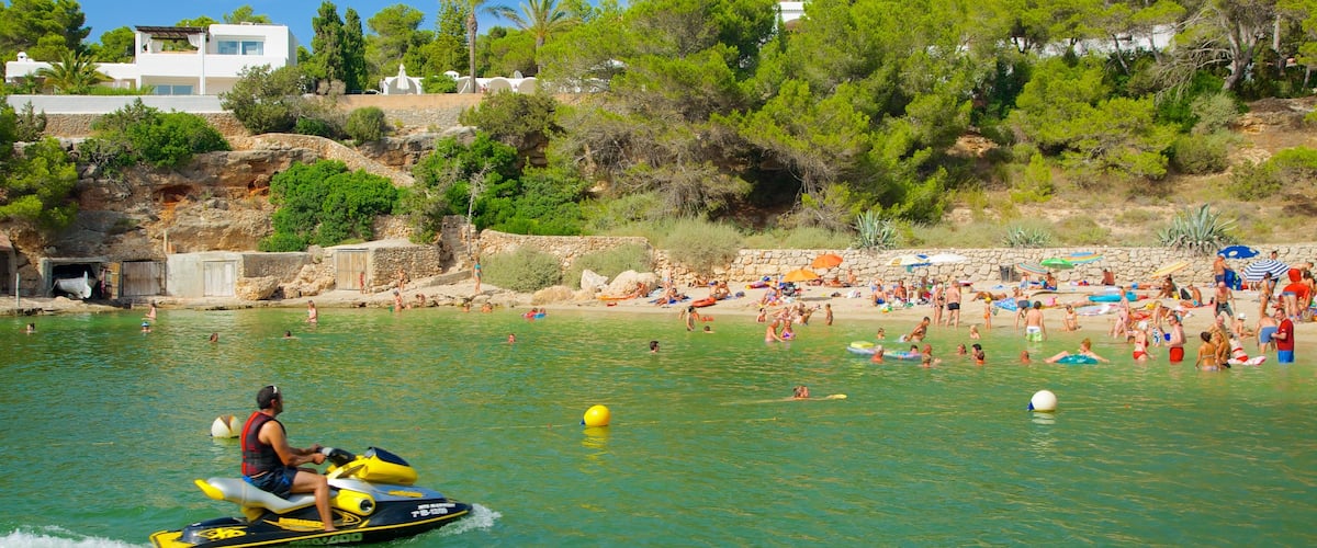 Cala Gracio featuring a coastal town, swimming and a beach