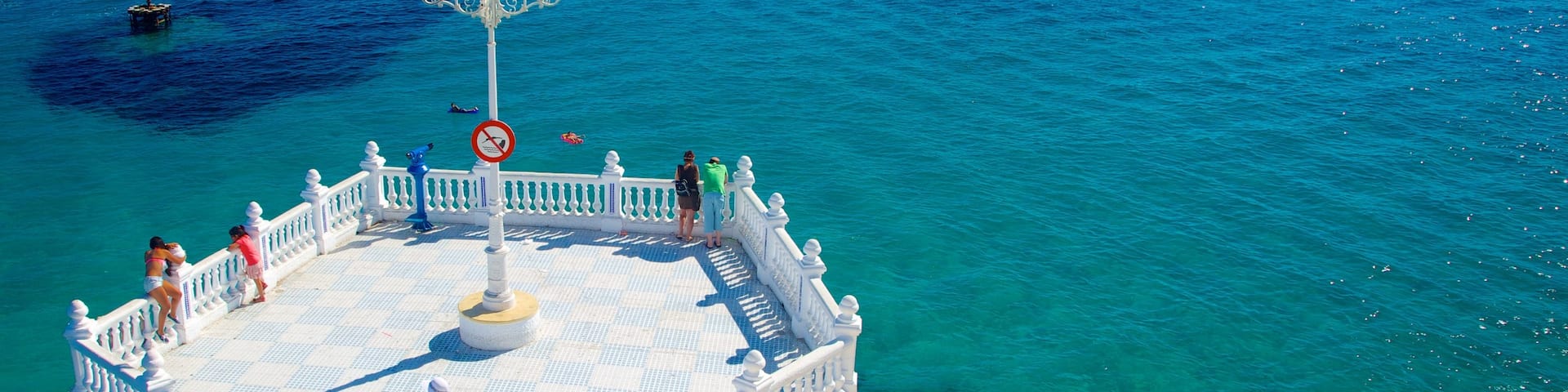 Benidorm which includes a coastal town, a bay or harbor and colorful reefs