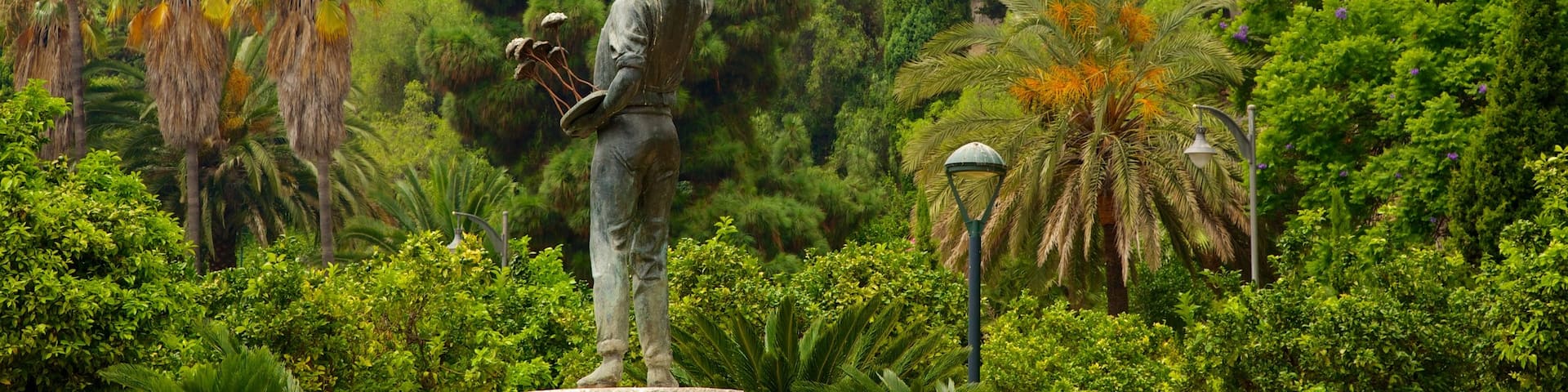 Alcazaba which includes heritage architecture and a statue or sculpture