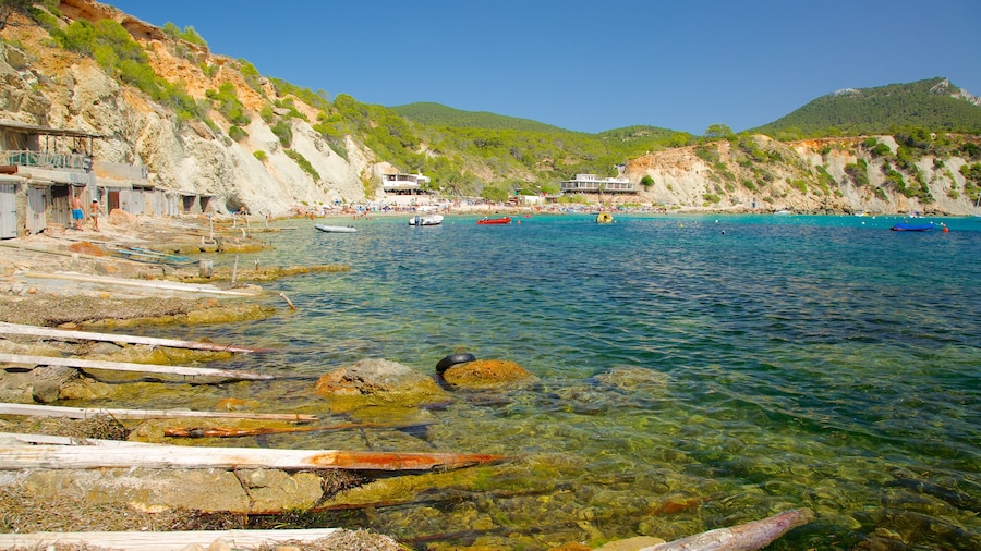 Cala d\'Hort Beach featuring a pebble beach, landscape views and boating