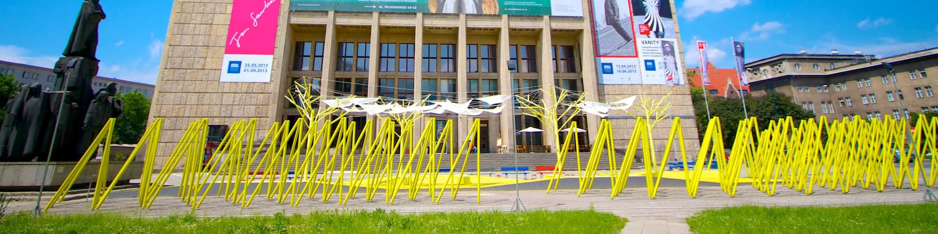 Krakow which includes signage, a city and modern architecture
