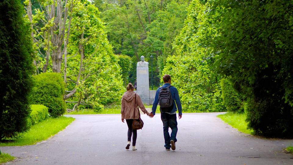 Jordan Park which includes a park and a statue or sculpture as well as a couple