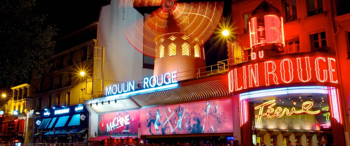 Moulin Rouge showing theatre scenes, signage and nightlife