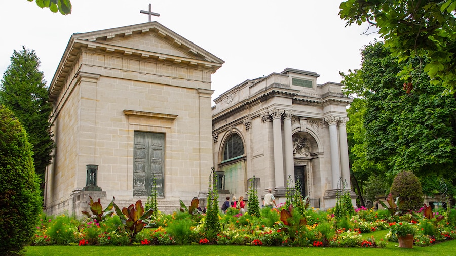 Ornate tombs and serene paths at Père Lachaise Cemetery in Paris, France.