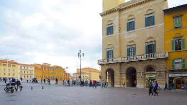 Palazzo Pretorio which includes heritage architecture, a square or plaza and a city