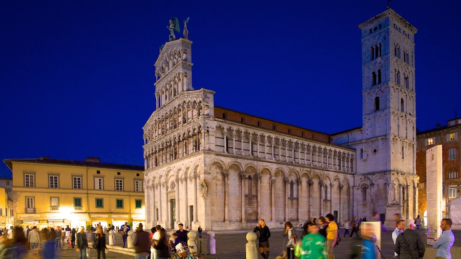 Piazza San Michele which includes a city, a church or cathedral and heritage architecture